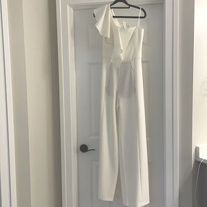 Black Halo jumpsuit, perfect for wedding events